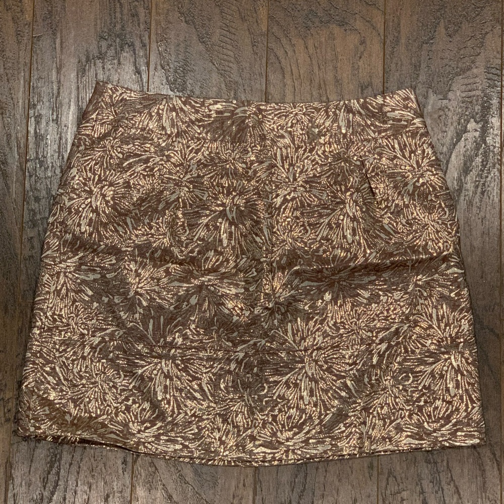 Metallic mini skirt.